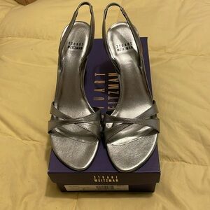 NWB Stuart Weitzman silver sling back high heeled sandal.